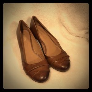 Brown leather 1 1/2 inch wedge heels.